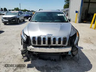 2016 Jeep Cherokee Overland z VIN 1C4PJMJSXGW300719, wystawiony jako Copart lot #58216665 z przebiegiem 128 016 mil mil oraz Szkoda całkowita • Salvage title. Historia ofert i sprzedaży dostępna na DreamBid. Obrazek 5.