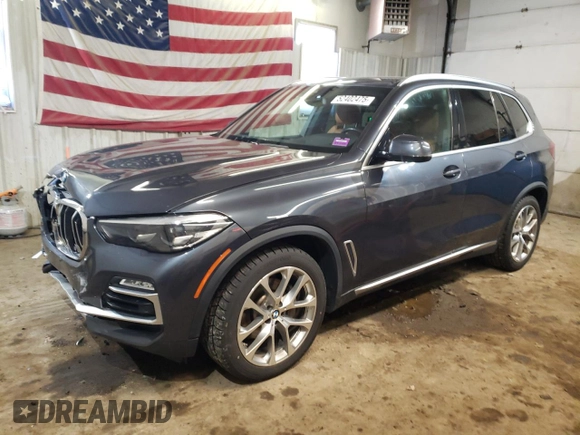 2021 BMW X5 xDrive40i with VIN 5UXCR6C06M9E05140, listed as a Copart auction lot 52402475 with 47,869 mi miles and Salvage title. Bid and sale history available at DreamBid. Image 1.
