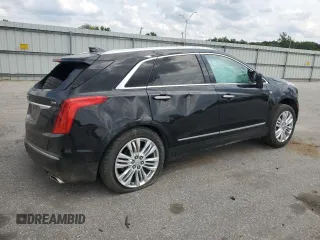 2018 Cadillac XT5 Premium Luxury FWD z VIN 1GYKNERS9JZ234513, wystawiony jako Copart lot #54105735 z przebiegiem 127 345 mil mil oraz Szkoda całkowita • Salvage title. Historia ofert i sprzedaży dostępna na DreamBid. Obrazek 3.