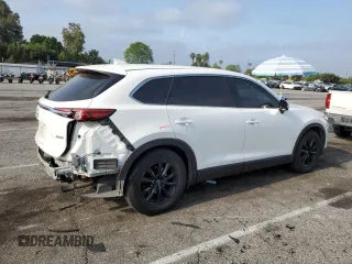 2016 Mazda CX-9 Touring with VIN JM3TCACY7G0110041, listed as a Copart auction lot 59218545 with 142,198 mi miles and Salvage title. Bid and sale history available at DreamBid. Image 3.