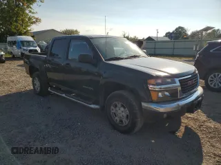 2005 GMC Canyon 1SF SLE Z71 with VIN 1GTDT136558165727, listed as a Copart auction lot 71416414 with 124,674 mi miles and Clean Title. Bid and sale history available at carsss.com. Image 4.