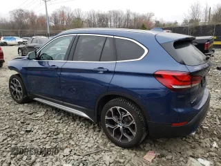 2021 BMW X1 xDrive28i z VIN WBXJG9C06M5T81056, wystawiony jako Copart lot #48388235 z przebiegiem 64 863 mil mil oraz Szkoda całkowita • Salvage title. Historia ofert i sprzedaży dostępna na DreamBid. Obrazek 2.