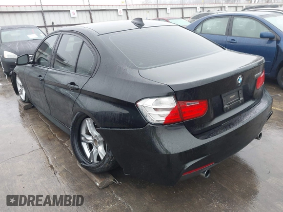 2014 BMW 3 Series 335i with VIN WBA3A9C57EF477662, listed as a IAAI auction lot 41435544 with 129,543 mi miles. Bid and sale history available at carsss.com. Image 3.