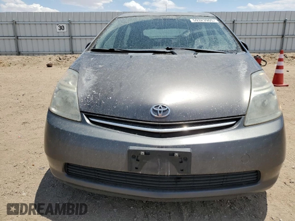 2007 Toyota Prius z VIN JTDKB20U773262222, wystawiony jako Copart lot #59323905 z przebiegiem 138 274 mil mil oraz Czysty tytuł • Clean title. Historia ofert i sprzedaży dostępna na DreamBid. Obrazek 5.