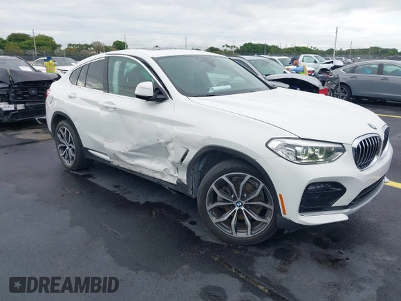 2020 BMW X4 xDrive30i z VIN 5UX2V1C02LLE68148, wystawiony jako IAAI lot #42253362 z przebiegiem 80 865 mil mil oraz . Historia ofert i sprzedaży dostępna na DreamBid. Obrazek 1.