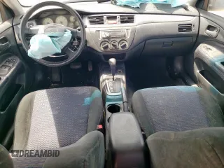2002 Mitsubishi Lancer OZ-Rally z VIN JA3AJ86E32U001737, wystawiony jako Copart lot #59275695 z przebiegiem 177 332 mil mil oraz Szkoda całkowita • Salvage title. Historia ofert i sprzedaży dostępna na DreamBid. Obrazek 8.