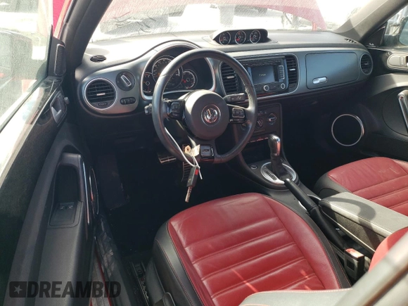 2014 Volkswagen Beetle Turbo R-Line with VIN 3VWVT7AT0EM656599, listed as a Copart auction lot 86358334 with 66,050 mi miles and Salvage Title. Bid and sale history available at DreamBid. Image 8.
