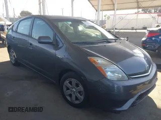 2007 Toyota Prius z VIN JTDKB20U873226409, wystawiony jako IAAI lot #42541909 z przebiegiem 128 374 mil mil oraz . Historia ofert i sprzedaży dostępna na DreamBid. Obrazek 1.