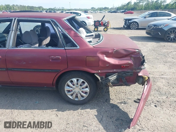 1991 Toyota Camry DLX z VIN 4T1SV21E0MU347371, wystawiony jako IAAI lot #42048695 z przebiegiem 209 451 mil mil oraz . Historia ofert i sprzedaży dostępna na DreamBid. Obrazek 11.