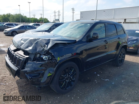 2021 Jeep Grand Cherokee Laredo E with VIN 1C4RJEAG0MC571375, listed as a IAAI auction lot 42087648 with 29,358 mi miles and . Bid and sale history available at DreamBid. Image 2.