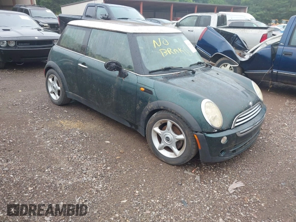 2006 MINI Hardtop with VIN WMWRC33506TK73564, listed as a IAAI auction lot 42602486 with 156,459 mi miles and . Bid and sale history available at DreamBid. Image 1.