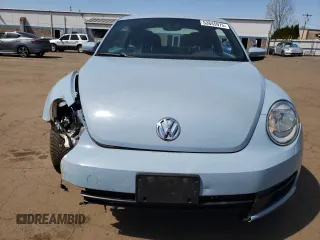 2013 Volkswagen Beetle 2.5L с VIN 3VWJP7AT4DM600568, выставлен на аукционе Copart как лот 53845975 с пробегом 168 724 миль миль и Списание • Salvage title. История ставок и продаж доступна на DreamBid. Изображение 5.