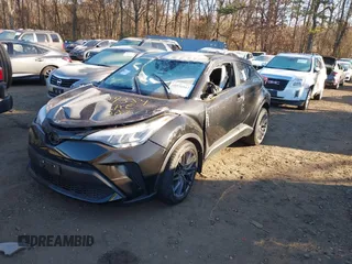 2021 Toyota C-HR LE with VIN JTNKHMBX1M1118203, listed as a IAAI auction lot 40936962 with 18,424 mi miles. Bid and sale history available at carsss.com. Image 2.