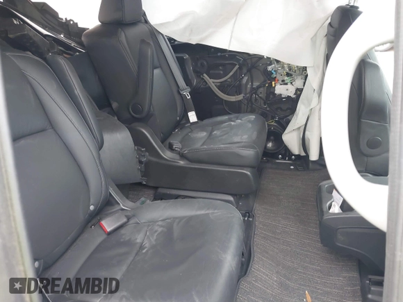2023 Honda Odyssey Touring with VIN 5FNRL6H81PB068721, listed as a IAAI auction lot 41489618 with 20,202 mi miles and . Bid and sale history available at DreamBid. Image 8.