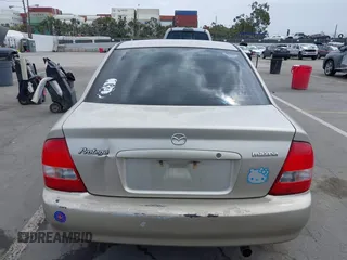 2002 Mazda Protege DX with VIN JM1BJ225121620394, listed as a IAAI auction lot 42043056 with 187,360 mi miles and . Bid and sale history available at DreamBid. Image 17.