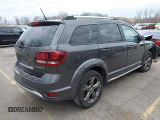 2015 Dodge Journey Crossroad with VIN 3C4PDCGB0FT639390, listed as a IAAI auction lot 41881370 with 164,219 mi miles and . Bid and sale history available at DreamBid. Image 4.