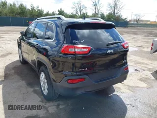2014 Jeep Cherokee Latitude with VIN 1C4PJMCS6EW219999, listed as a IAAI auction lot 42044695 with 169,533 mi miles and . Bid and sale history available at carsss.com. Image 3.