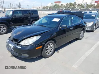 2002 Lexus ES 300 with VIN JTHBF30G720015358, listed as a IAAI auction lot 42127438 with 188,969 mi miles. Bid and sale history available at carsss.com. Image 2.