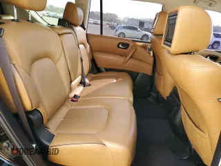 2017 Nissan Armada Platinum z VIN JN8AY2ND1H9000556, wystawiony jako Copart lot #49846525 z przebiegiem 179 394 mil mil oraz Szkoda całkowita • Salvage title. Historia ofert i sprzedaży dostępna na DreamBid. Obrazek 11.