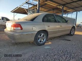 2000 Cadillac Catera z VIN W06VR54R5YR010954, wystawiony jako Copart lot #84863204 z przebiegiem 47 864 mil mil oraz Tytuł czysty. Historia ofert i sprzedaży dostępna na DreamBid. Obrazek 3.