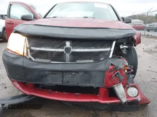 2009 Dodge Avenger SXT with VIN 1B3LC56BX9N523621, listed as a IAAI auction lot 41068673 with 174,055 mi miles. Bid and sale history available at carsss.com. Image 12.