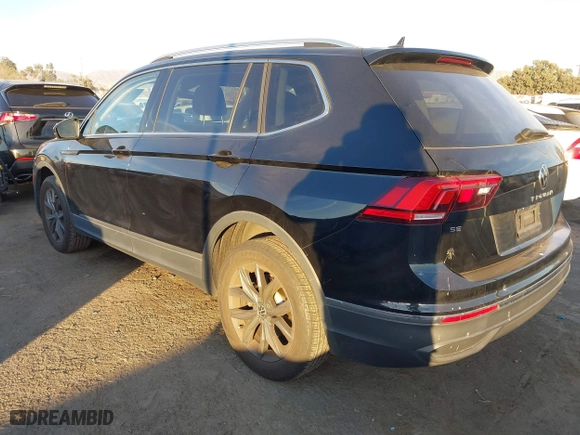 2022 Volkswagen Tiguan SE with VIN 3VV3B7AX1NM083939, listed as a IAAI auction lot 41158579 with 77,111 mi miles. Bid and sale history available at carsss.com. Image 3.