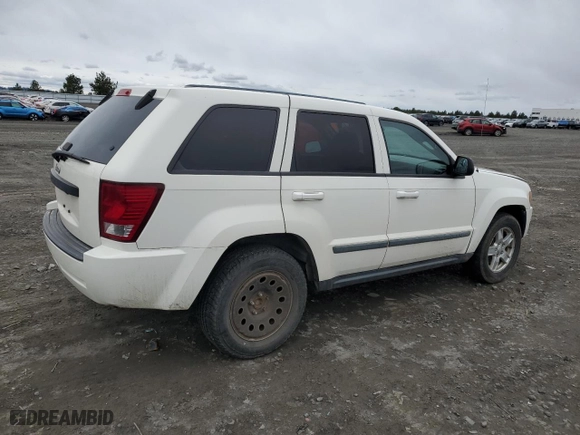 2007 Jeep Grand Cherokee Laredo with VIN 1J8GR48K17C638499, listed as a Copart auction lot 49649565 with 195,000 mi miles and Salvage Title. Bid and sale history available at carsss.com. Image 3.