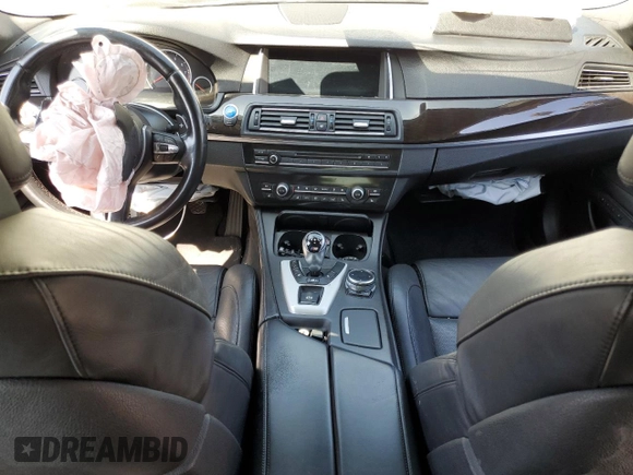 2014 BMW M5 with VIN WBSFV9C57ED097570, listed as a Copart auction lot 69757854 with 0 mi miles and Salvage Title. Bid and sale history available at carsss.com. Image 8.