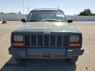 1998 Jeep Cherokee Sport with VIN 1J4FJ68S5WL108020, listed as a Copart auction lot 60150655 with 290,595 mi miles and Salvage title. Bid and sale history available at DreamBid. Image 5.