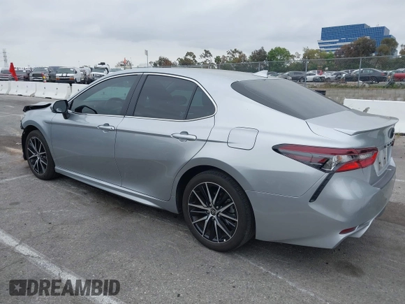 2023 Toyota Camry SE with VIN 4T1G11AKXPU809876, listed as a IAAI auction lot 42100546 with 35,055 mi miles and . Bid and sale history available at DreamBid. Image 3.