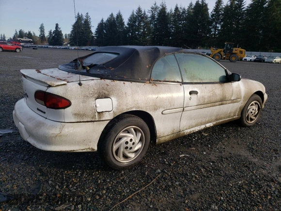 1997 Chevrolet Cavalier with VIN 4G1JF324XVB103224, listed as a Copart auction lot 77187614 with 102,866 mi miles and Clean Title. Bid and sale history available at DreamBid. Image 3.