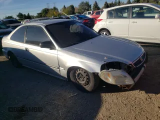 1999 Honda Civic DX with VIN 1HGEJ612XXL034351, listed as a Copart auction lot 76589714 with 192,975 mi miles and Salvage Title. Bid and sale history available at carsss.com. Image 4.