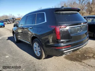 2023 Cadillac XT6 Luxury with VIN 1GYKPBR45PZ170389, listed as a Copart auction lot 80903903 with 5,615 mi miles. Bid and sale history available at carsss.com. Image 2.
