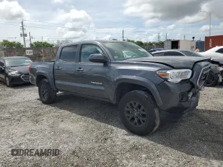 2023 Toyota Tacoma SR with VIN 3TMCZ5AN6PM571686, listed as a Copart auction lot 60260095 with 29,687 mi miles and Non repairable. Bid and sale history available at DreamBid. Image 4.