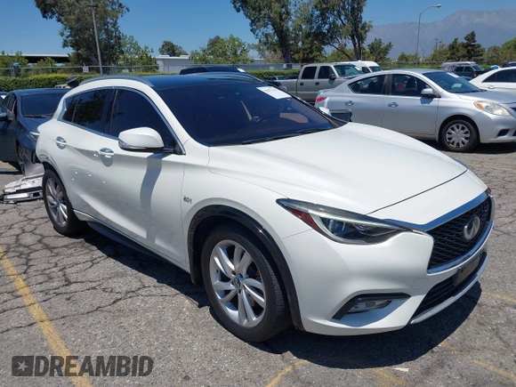 2018 Infiniti QX30 Premium z VIN SJKCH5CP5JA006199, wystawiony jako IAAI lot #42673215 z przebiegiem 107 294 mil mil oraz . Historia ofert i sprzedaży dostępna na DreamBid. Obrazek 1.