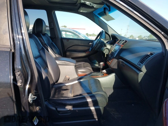 2004 Acura MDX with VIN 2HNYD18294H538551, listed as a IAAI auction lot 42153231 with 217,462 mi miles. Bid and sale history available at carsss.com. Image 5.