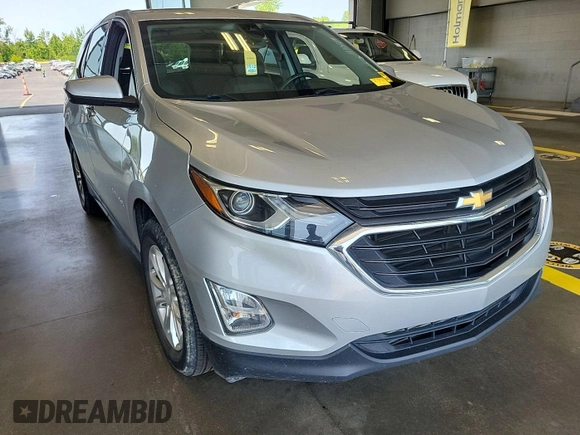 2020 Chevrolet Equinox LT with VIN 2GNAXJEV0L6236404, listed as a IAAI auction lot 42619695 with 77,124 mi miles and . Bid and sale history available at DreamBid. Image 27.
