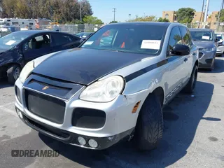 2005 Porsche Cayenne S with VIN WP1AB29P05LA61329, listed as a IAAI auction lot 42000816 with 163,238 mi miles. Bid and sale history available at carsss.com. Image 2.