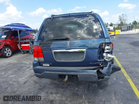2003 Lincoln Aviator Luxury z VIN 5LMEU68H13ZJ46598, wystawiony jako IAAI lot #41985439 z przebiegiem 160 570 mil mil oraz . Historia ofert i sprzedaży dostępna na DreamBid. Obrazek 6.