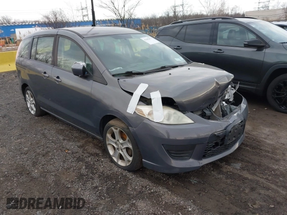 2010 Mazda 5 Sport with VIN JM1CR2WLXA0370650, listed as a IAAI auction lot 41602072 with 142,611 mi miles and . Bid and sale history available at DreamBid. Image 1.