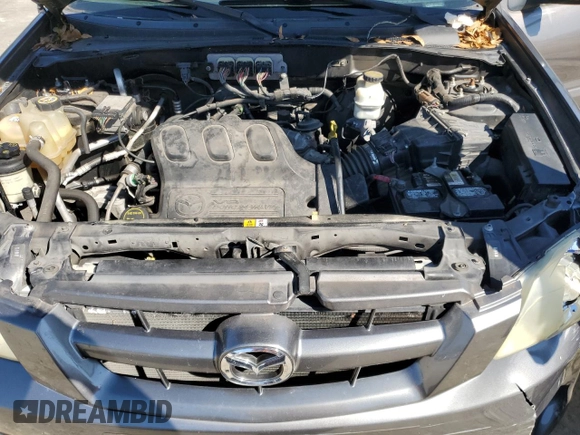 2006 Mazda Tribute S with VIN 4F2YZ041X6KM24035, listed as a Copart auction lot 45943285 with 105,040 mi miles and Salvage Title. Bid and sale history available at DreamBid. Image 12.
