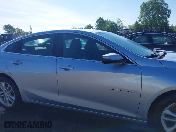 2018 Chevrolet Malibu LT z VIN 1G1ZD5ST4JF225982, wystawiony jako IAAI lot #42290615 z przebiegiem 122 483 mil mil oraz . Historia ofert i sprzedaży dostępna na DreamBid. Obrazek 13.
