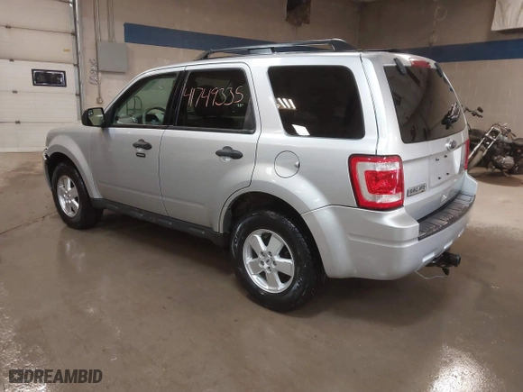 2010 Ford Escape XLT with VIN 1FMCU0DG5AKB02811, listed as a IAAI auction lot 41749335 with 103,071 mi miles. Bid and sale history available at carsss.com. Image 3.