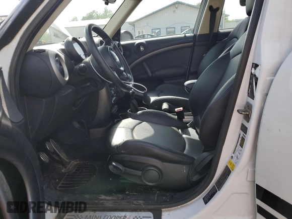 2012 MINI Countryman S with VIN WMWZC5C5XCWM14551, listed as a Copart auction lot 57329265 with 140,814 mi miles and Clean Title. Bid and sale history available at DreamBid. Image 7.