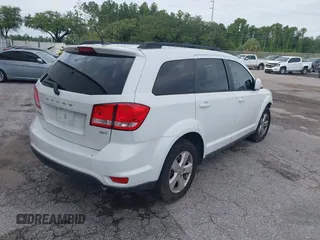 2012 Dodge Journey SXT with VIN 3C4PDCBG3CT331693, listed as a IAAI auction lot 42624751 with 165,480 mi miles and . Bid and sale history available at DreamBid. Image 4.