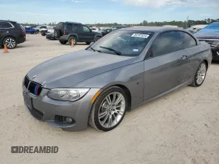 2012 BMW 3 Series 335i with VIN WBADX7C58CE744687, listed as a Copart auction lot 83197624 with 157,416 mi miles and Salvage title. Bid and sale history available at DreamBid. Image 1.