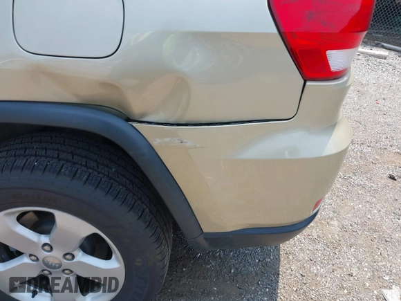 2011 Jeep Grand Cherokee Laredo with VIN 1J4RR4GG0BC713919, listed as a IAAI auction lot 42425229 with 139,379 mi miles and . Bid and sale history available at DreamBid. Image 6.