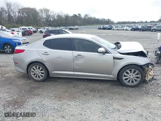 2015 Kia Optima EX with VIN 5XXGN4A75FG405216, listed as a IAAI auction lot 41794597 with 237,403 mi miles. Bid and sale history available at carsss.com. Image 14.