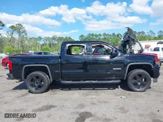 2017 GMC Sierra 1500 SLE with VIN 3GTU2MEC6HG413635, listed as a IAAI auction lot 41996497 with 63,532 mi miles. Bid and sale history available at carsss.com. Image 13.