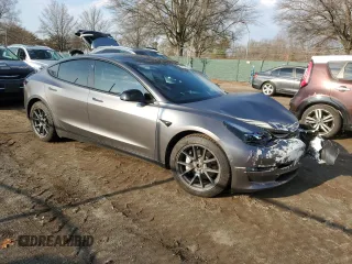 2022 Tesla Model 3 Long Range with VIN 5YJ3E1EBXNF272496, listed as a Copart auction lot 43973435 with 28,450 mi miles and Salvage Title. Bid and sale history available at DreamBid. Image 4.